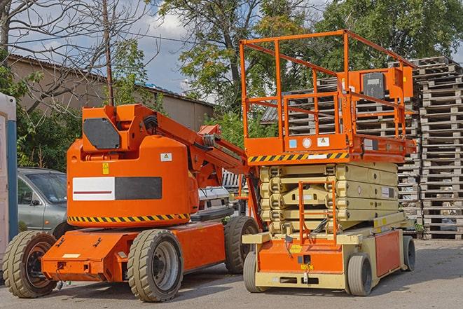 forklift transporting goods in a warehouse setting in Dutton, VA